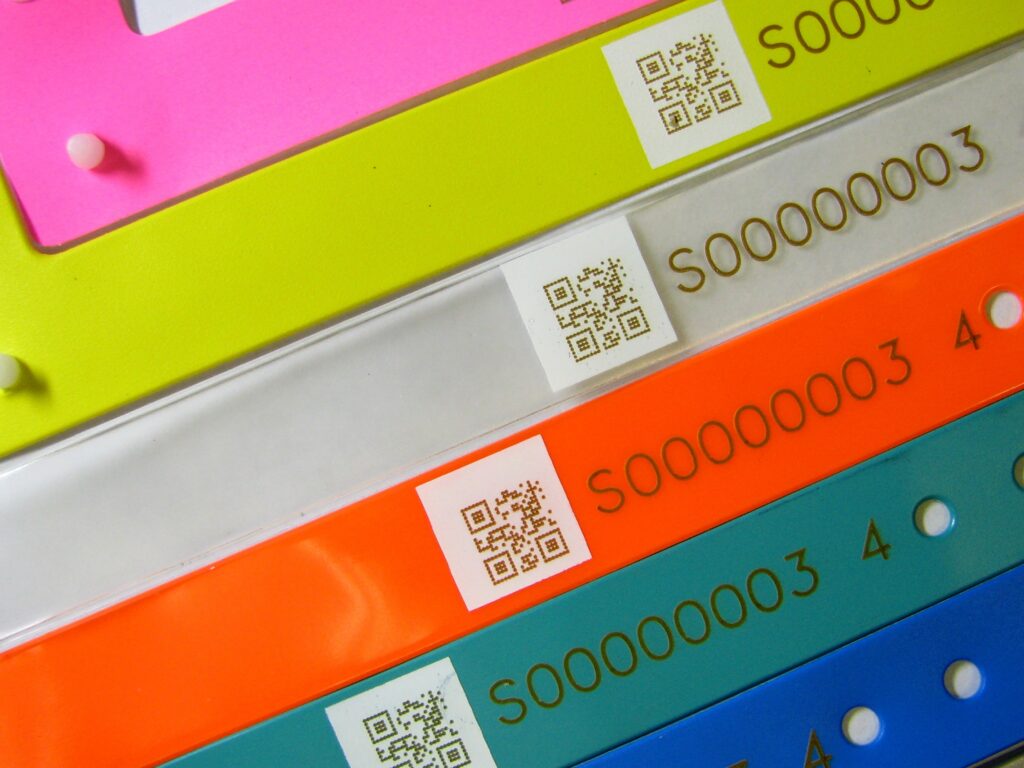 Different colored plastics laser marked with QR code and serial number