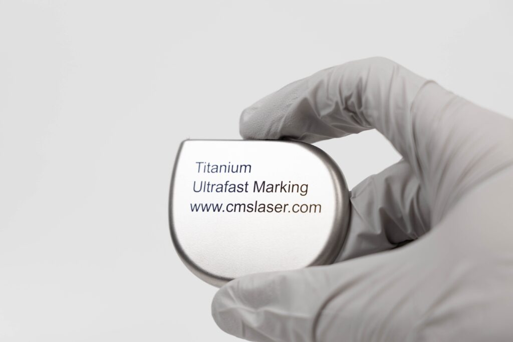 Ultrafast laser marked titanium pacemaker housing