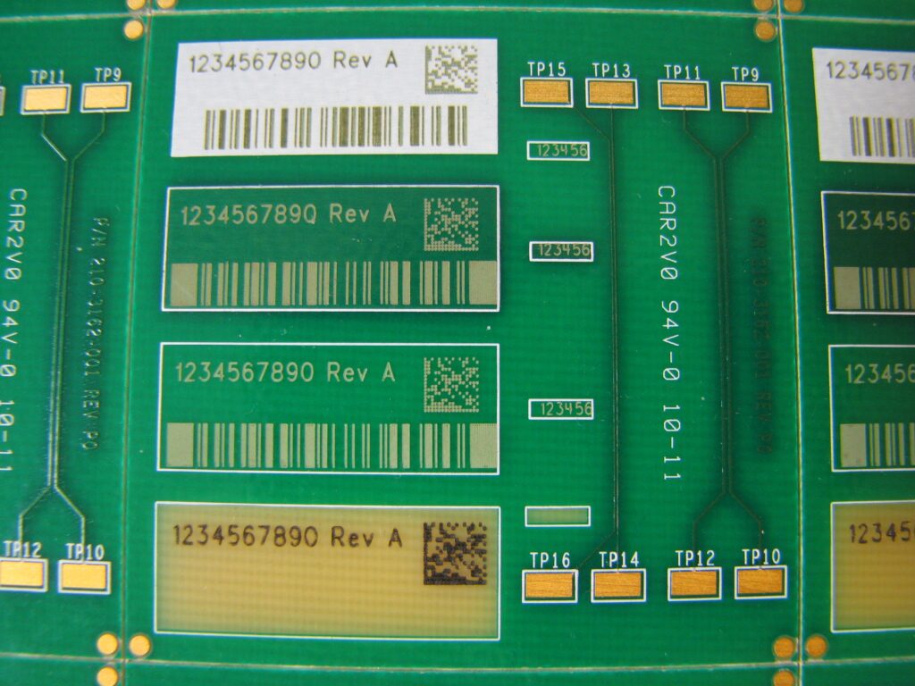 Laser marked printed circuit board with barcodes and text