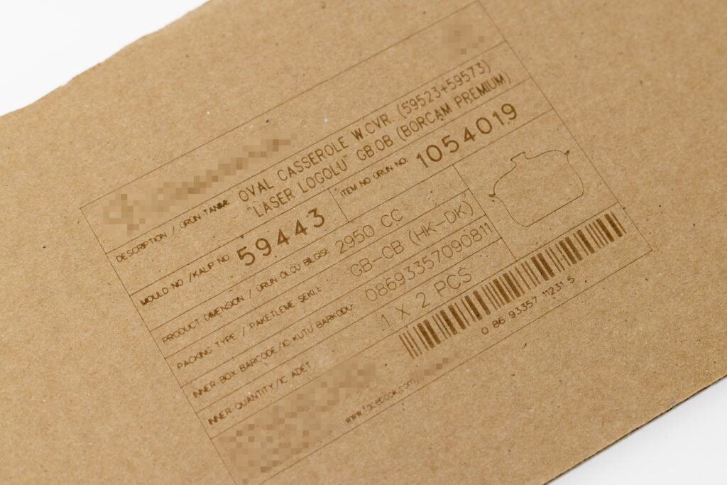 Laser marked cardboard box with barcode and product information