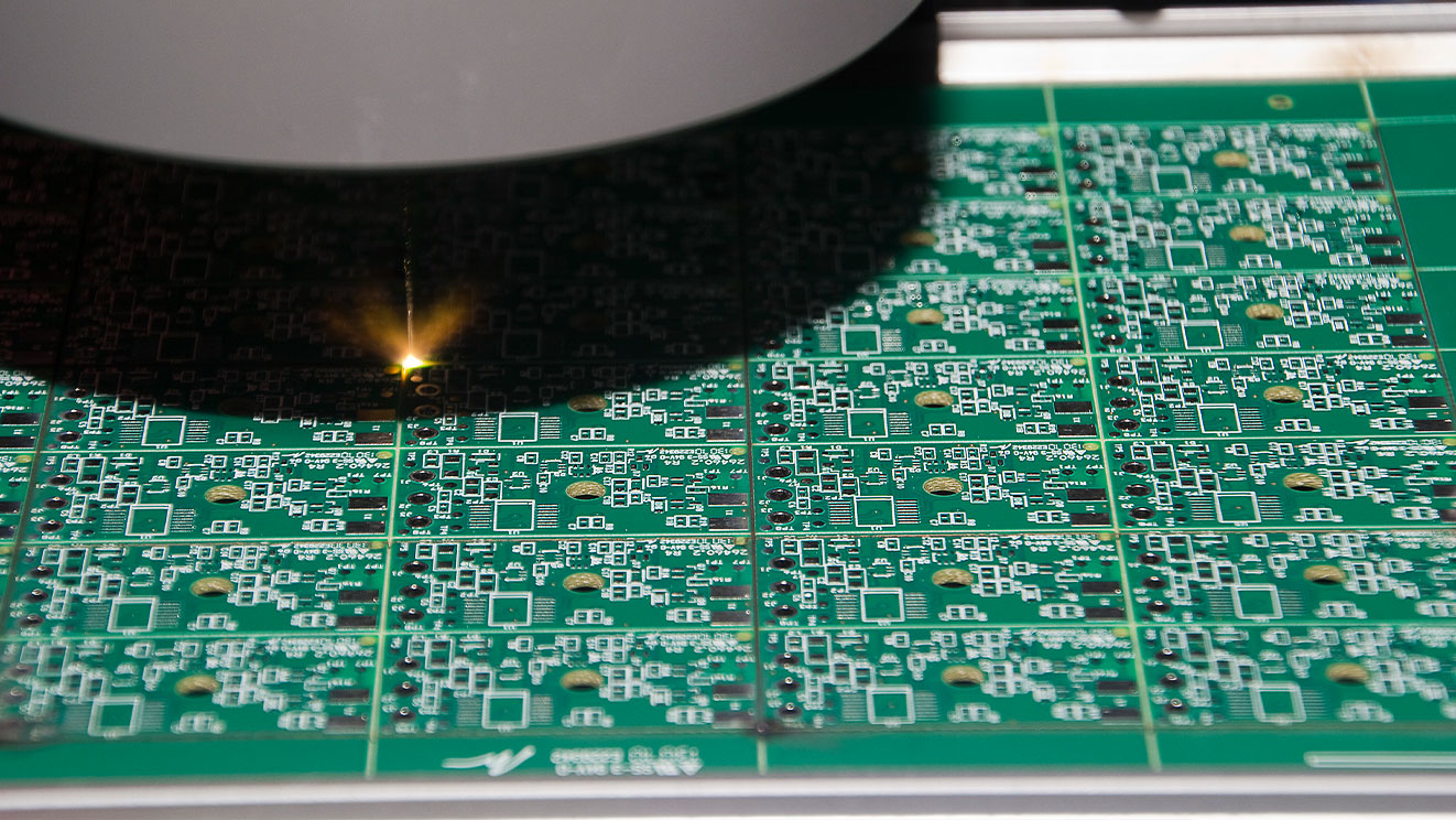 CO2 laser cutting printed circuit board array