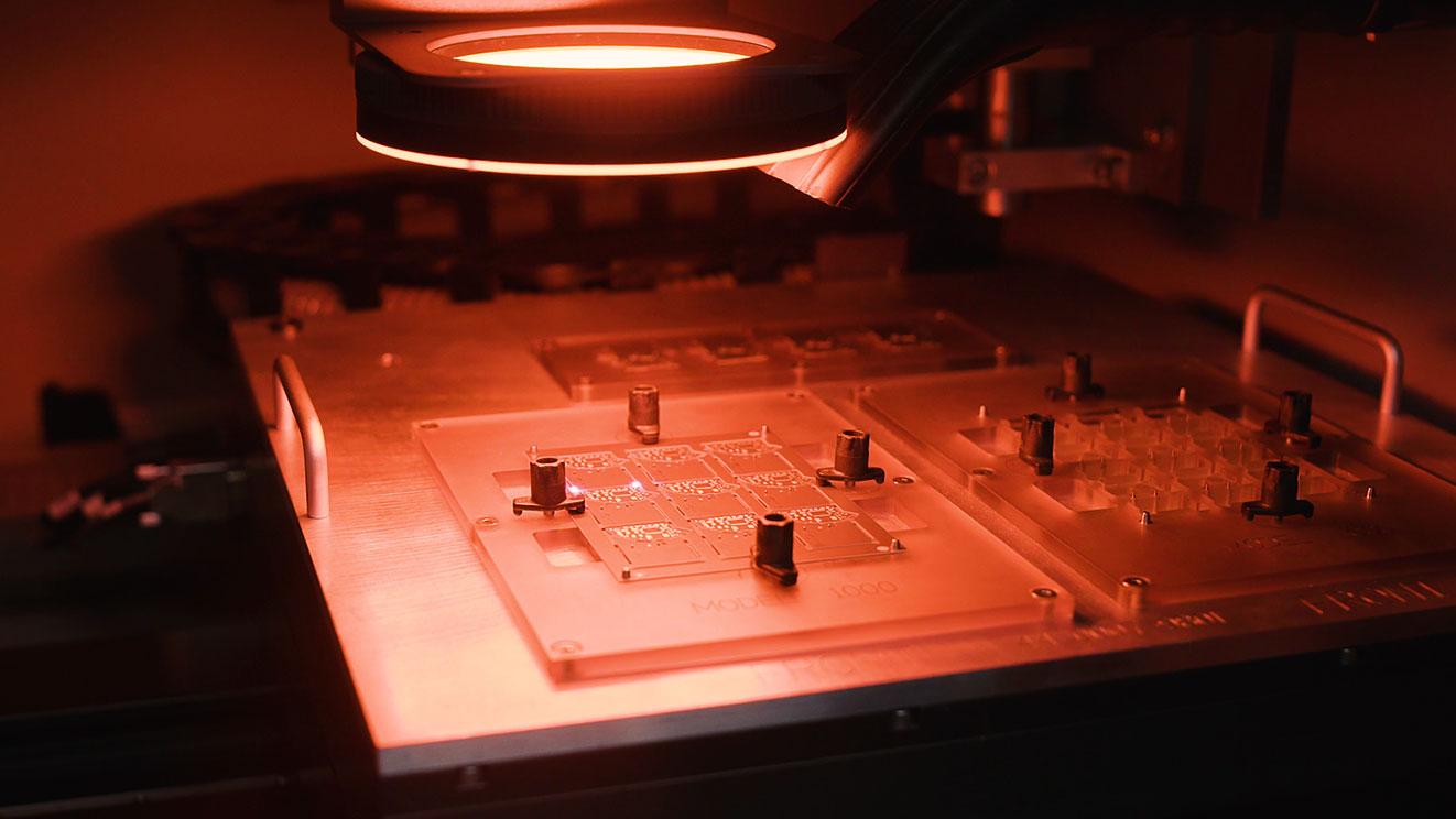UV Laser depaneling PCBs using through the optics vision